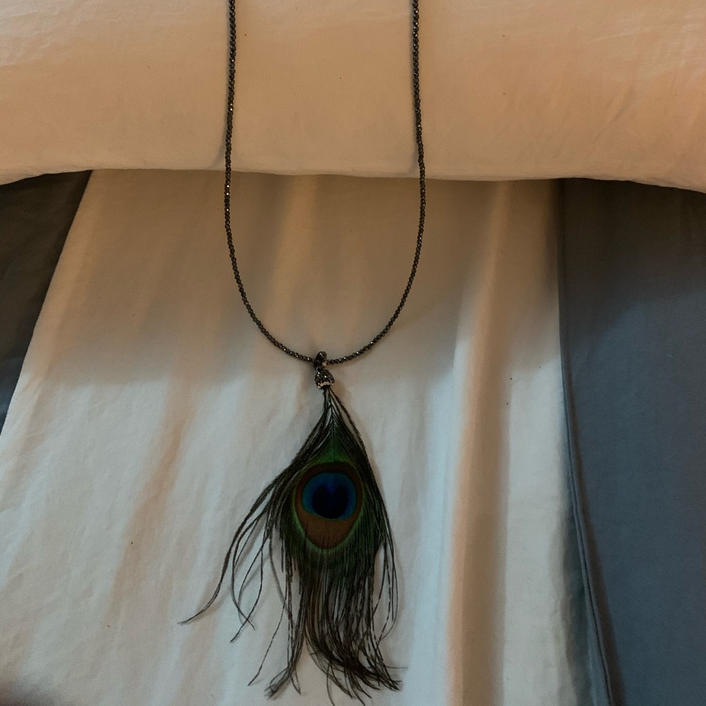 Unique crystal and peacock feather necklace!
